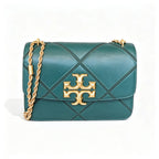 Tory Burch Eleanor in deep sea green with a gold double-T adjustable twist chain shoulder strap offering multiple carrying options for women