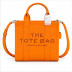 Marc Jacobs The Tote Bag Small Mustard Yellow Pebbled Leather Tote Bag with Adjustable Crossbody Strap