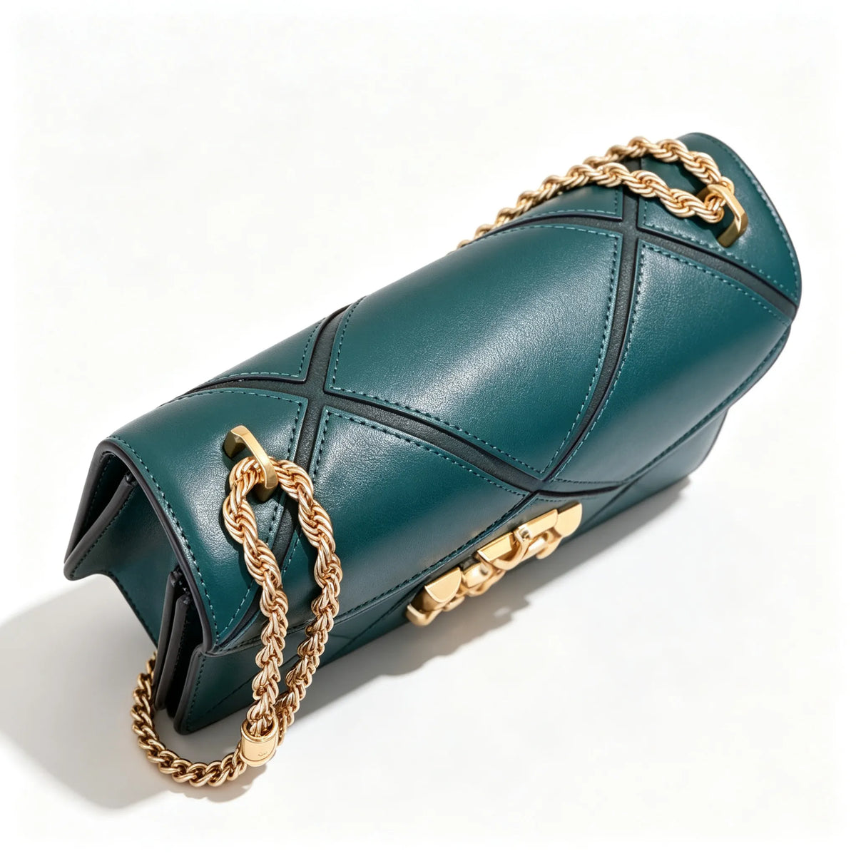 Tory Burch Eleanor in deep sea green with a gold double-T adjustable twist chain shoulder strap offering multiple carrying options for women