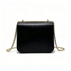 Tory Burch Eleanor | Black leather adjustable chain shoulder strap multiple carrying options women's designer handbag