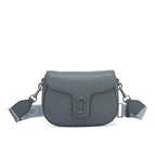 Marc Jacobs J Marc Saddle Bag, bright green smooth leather crossbody bag with brand logo shoulder strap.