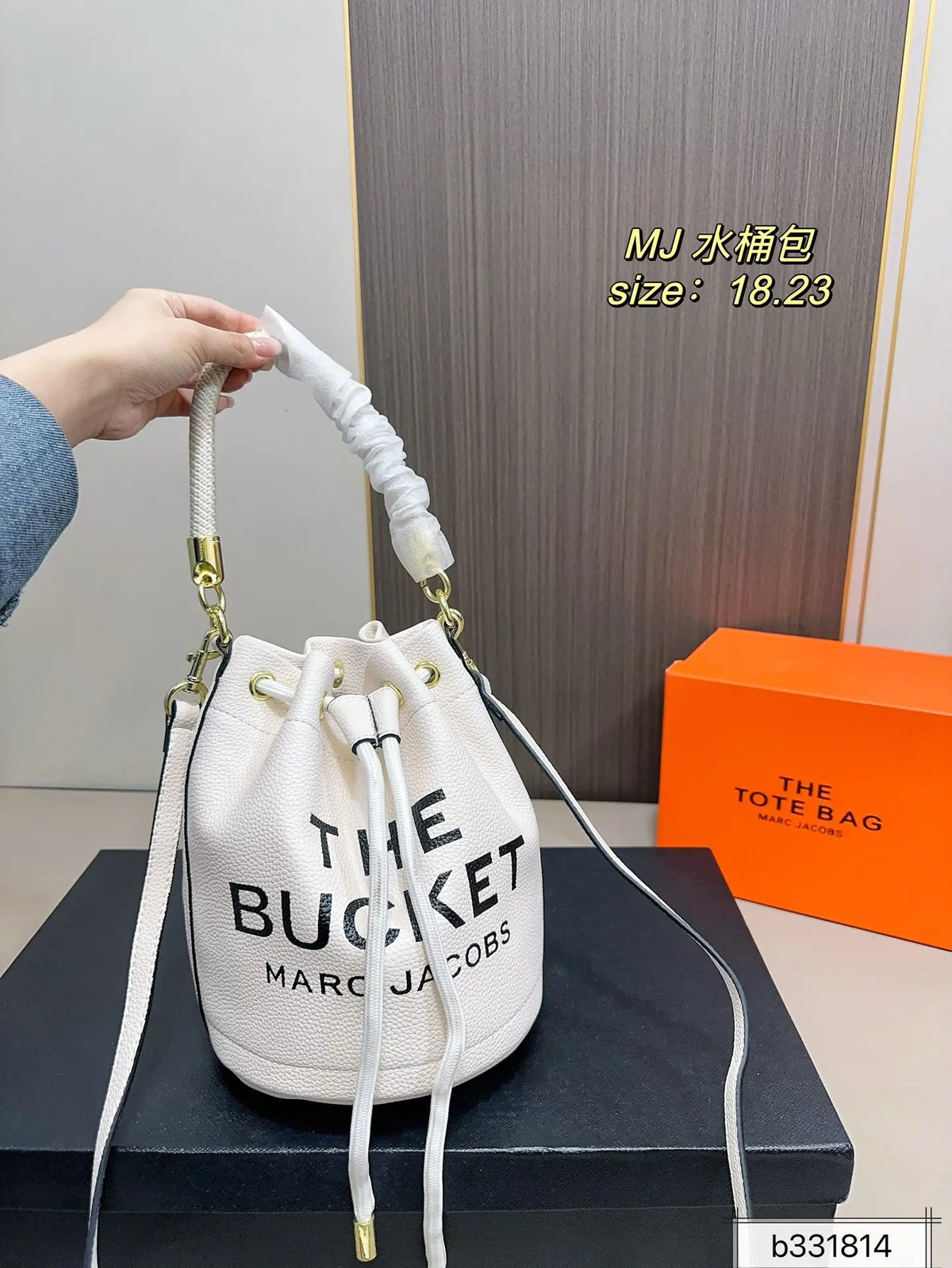 Marc Jacobs The Bucket Small Black Pebbled Leather Bucket Bag with White Logo Print & Detachable Strap