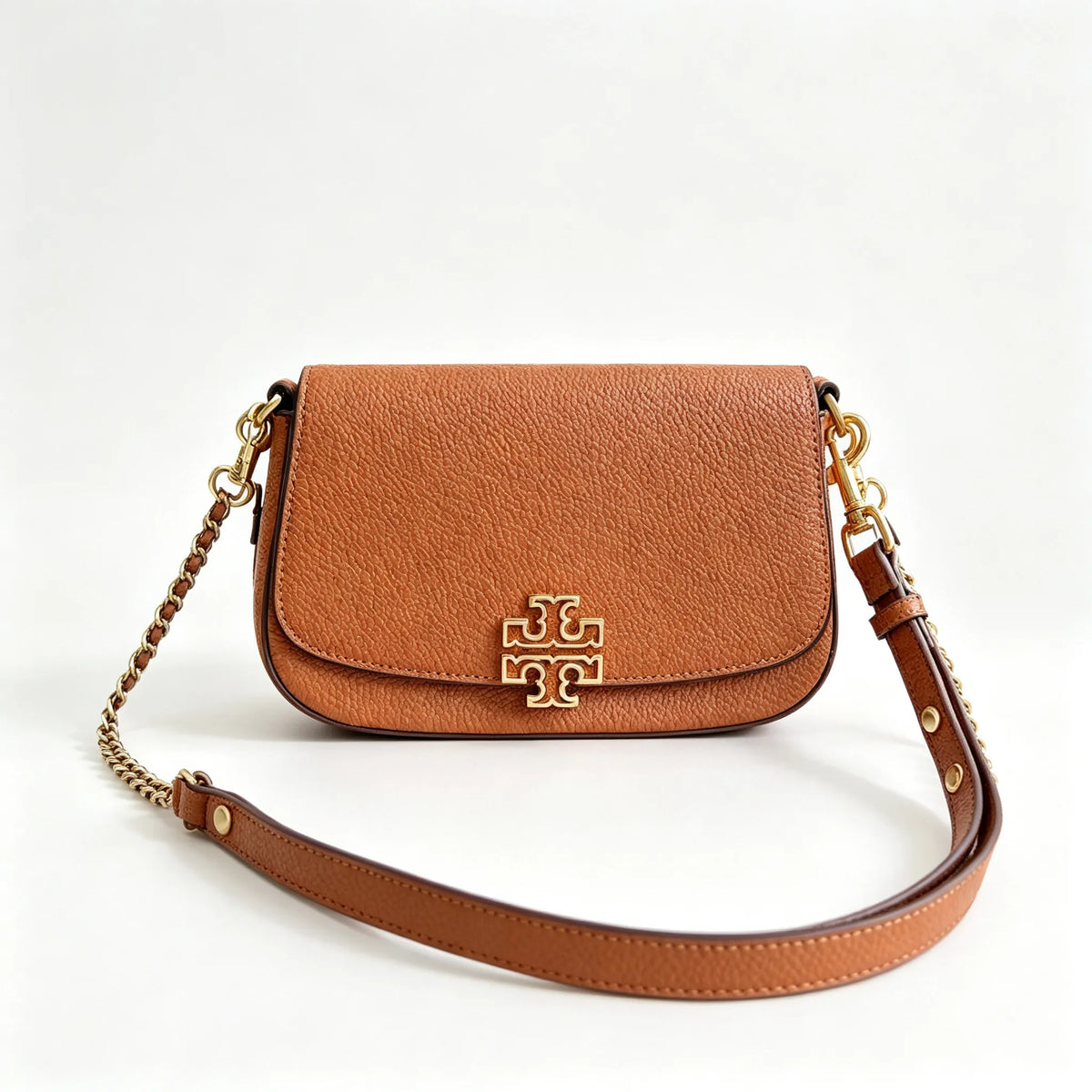 Tory Burch Britten caramel brown adjustable shoulder strap and zippered lining a small everyday bag for women