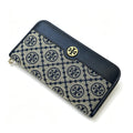 Tory Burch T Monogram wallet in navy and beige Monogram canvas, long with multiple card slots and a zipper