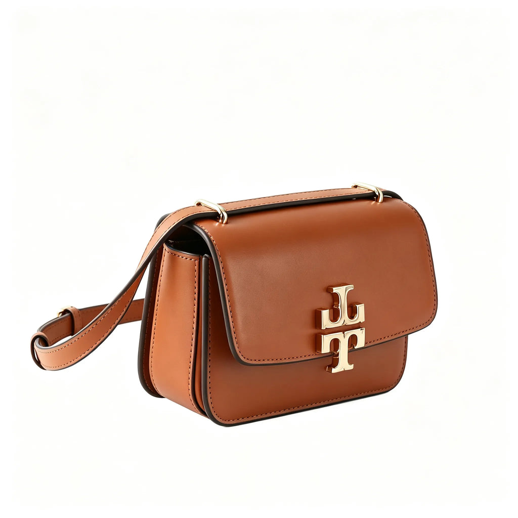 Tory Burch Eleanor | Caramel brown Nappa leather  adjustable shoulder strap  multiple carrying options  women's designer handbag