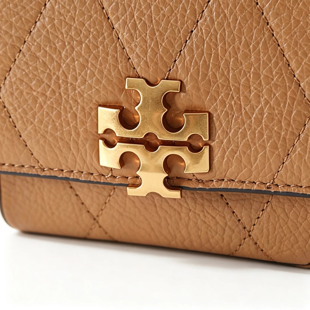 Tory Burch Kira | Mocha brown pebbled leather  adjustable chain shoulder strap multiple carrying options  women's designer handbag