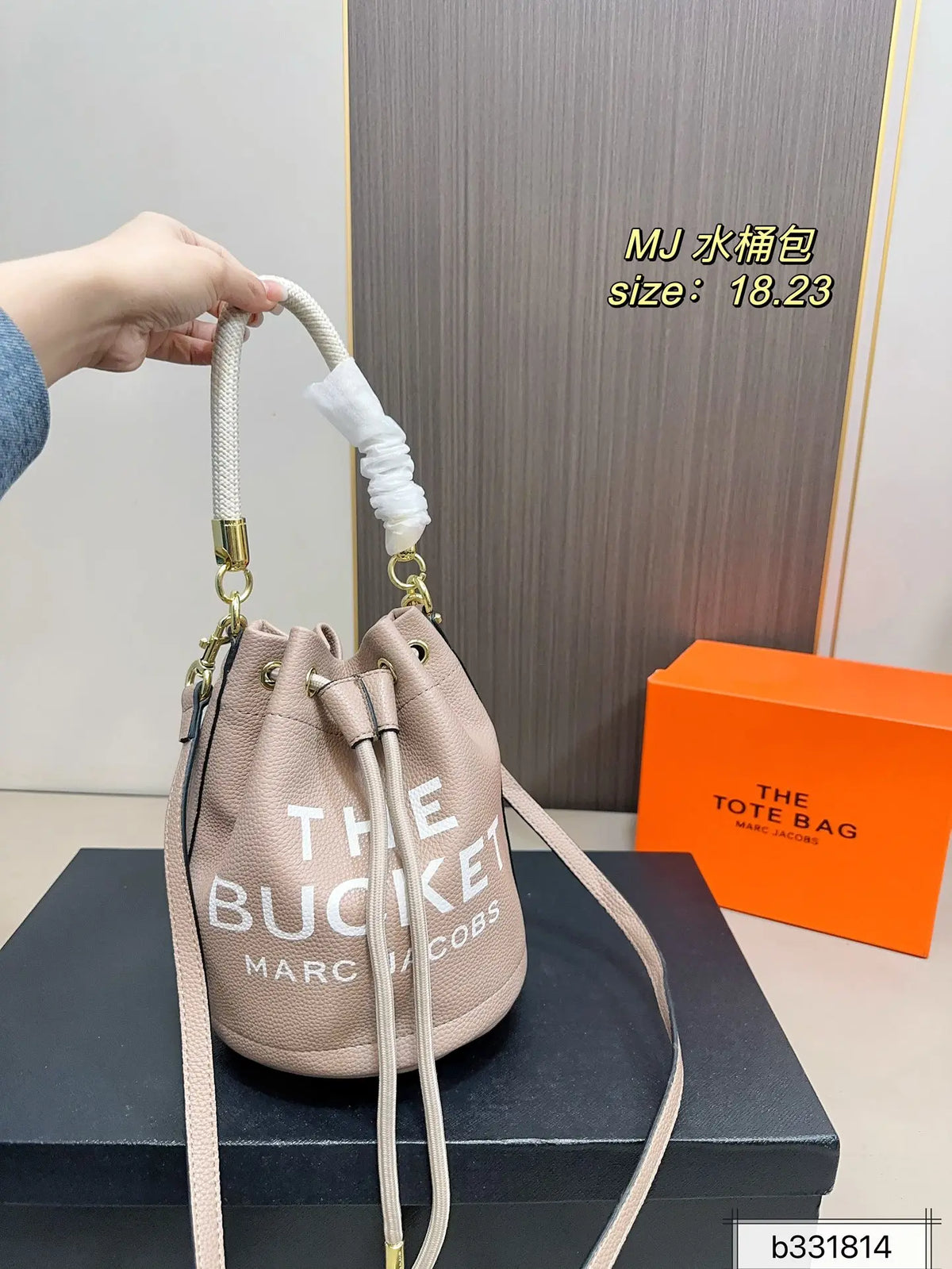 Marc Jacobs The Bucket Small Black Pebbled Leather Bucket Bag with White Logo Print & Detachable Strap