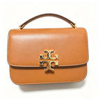Tory Burch Eleanor | Camel Nappa leather with a detachable shoulder strap multiple carrying options women's designer handbag