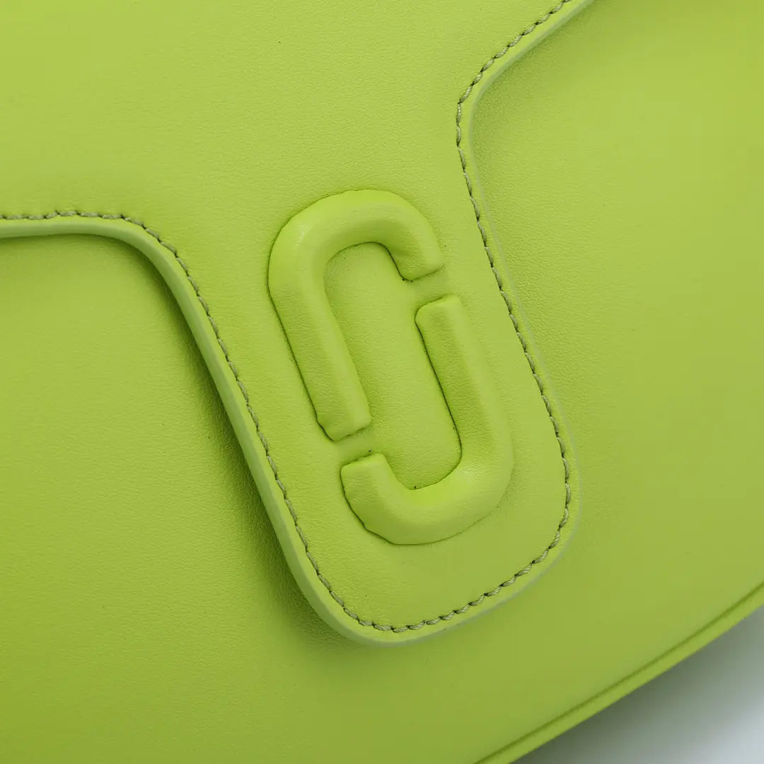 Marc Jacobs J Marc Saddle Bag, bright green smooth leather crossbody bag with brand logo shoulder strap.