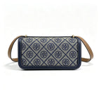 Tory Burch navy and beige Monogram canvas with an adjustable leather shoulder strap convertible into a crossbody or shoulder bag women's style