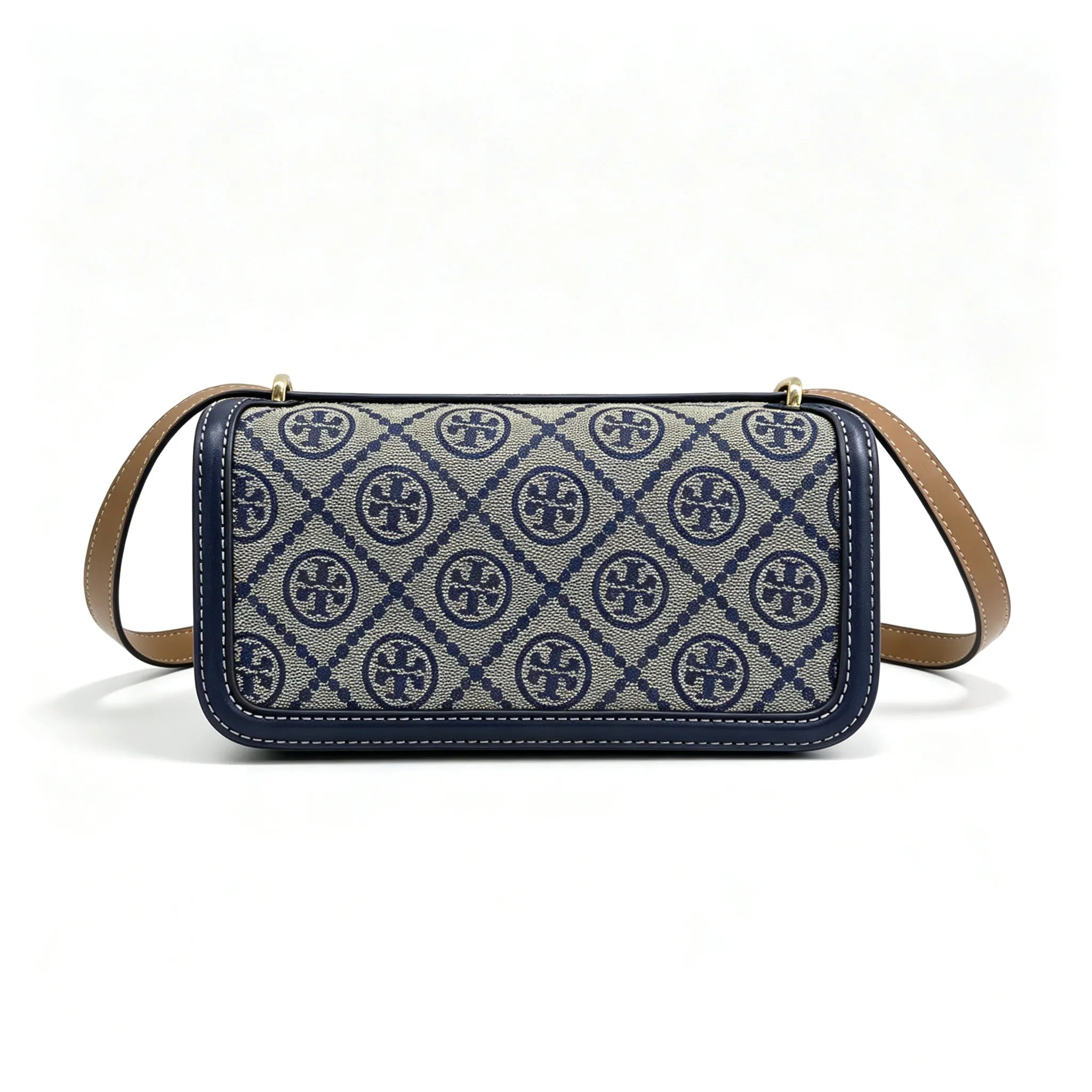 Tory Burch navy and beige Monogram canvas with an adjustable leather shoulder strap convertible into a crossbody or shoulder bag women's style
