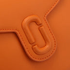 Marc Jacobs The J Marc Saddle Bag Orange Smooth Leather Crossbody Bag with Logo Strap
