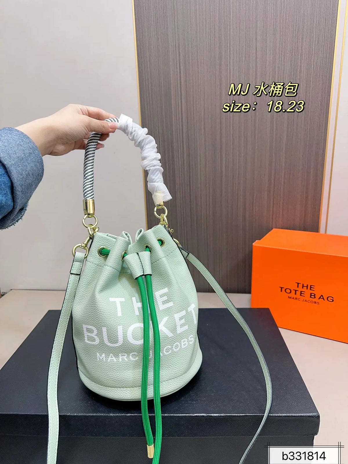Marc Jacobs The Bucket Small Black Pebbled Leather Bucket Bag with White Logo Print & Detachable Strap
