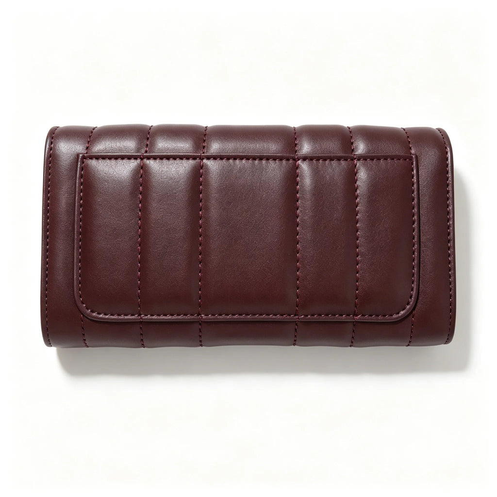 Tory Burch Kira burgundy quilted Nappa leather clutch with multiple card slots and a zippered coin purse