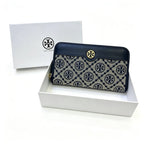 Tory Burch T Monogram wallet in navy and beige Monogram canvas, long with multiple card slots and a zipper