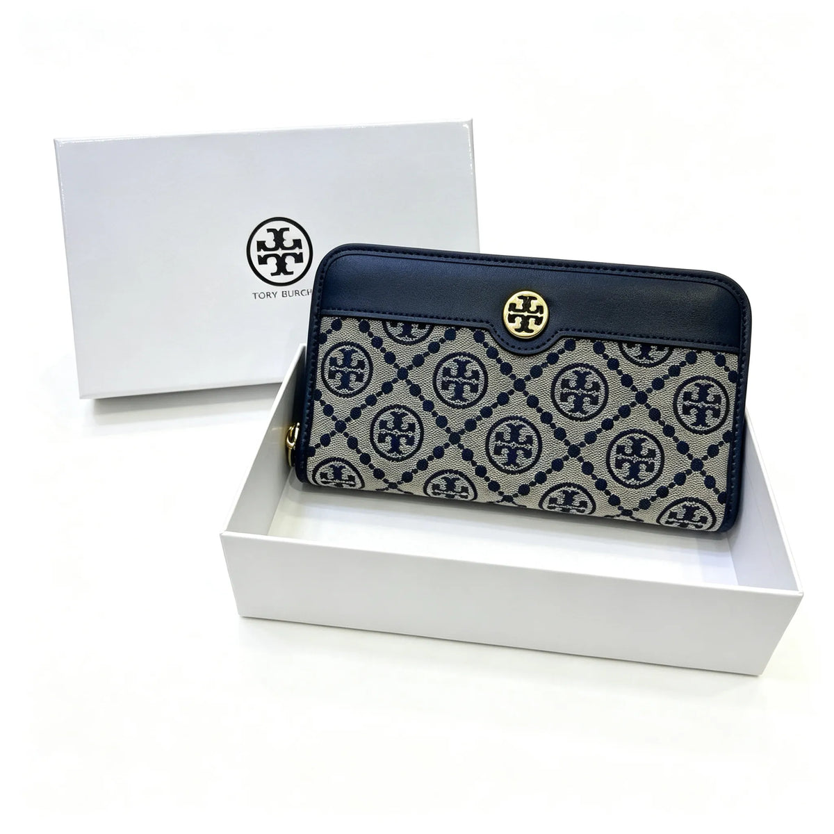 Tory Burch T Monogram wallet in navy and beige Monogram canvas, long with multiple card slots and a zipper