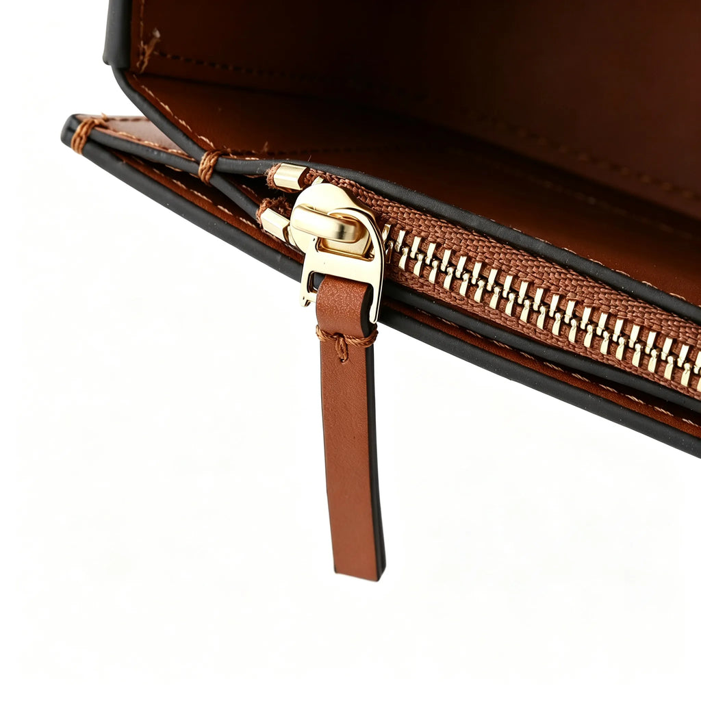 Tory Burch Eleanor | Caramel brown Nappa leather  adjustable shoulder strap  multiple carrying options  women's designer handbag