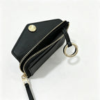 Tory Burch | Black embossed leather  multi-card slot design comes with a detachable wrist strap compact and portable  suitable for everyday use and travel