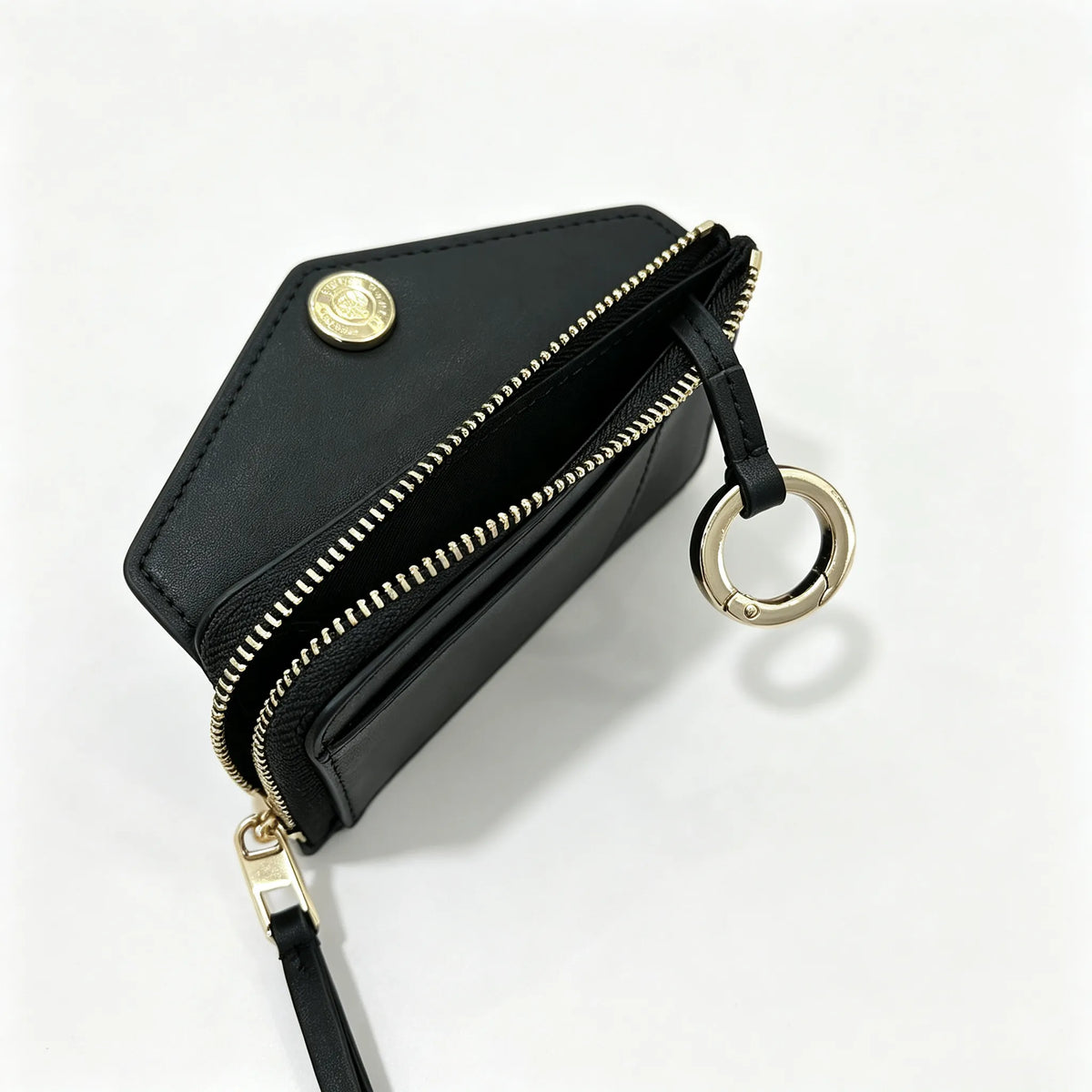 Tory Burch | Black embossed leather  multi-card slot design comes with a detachable wrist strap compact and portable  suitable for everyday use and travel