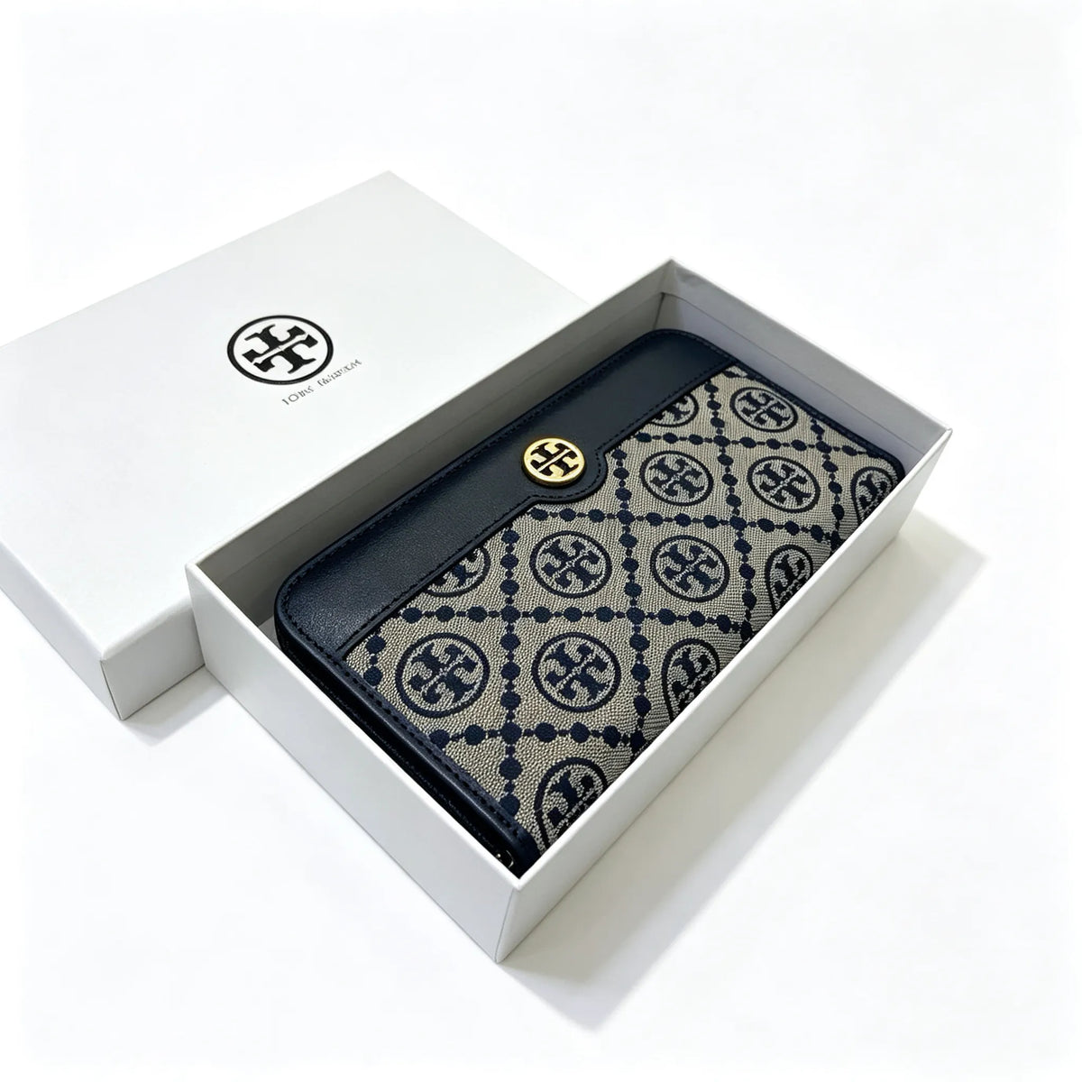 Tory Burch T Monogram wallet in navy and beige Monogram canvas, long with multiple card slots and a zipper