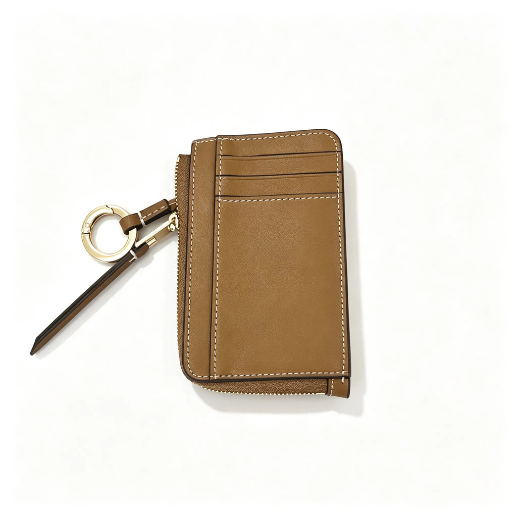 Tory Burch T-pattern keychain card holder | Hazelnut brown canvas with letter pattern multi-card slots comes with a detachable wrist strap  T-pattern keychain card holder