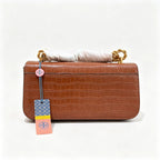 Tory Burch Eleanor tan embossed leather twisted chain shoulder strap  women's multi-way carrying option