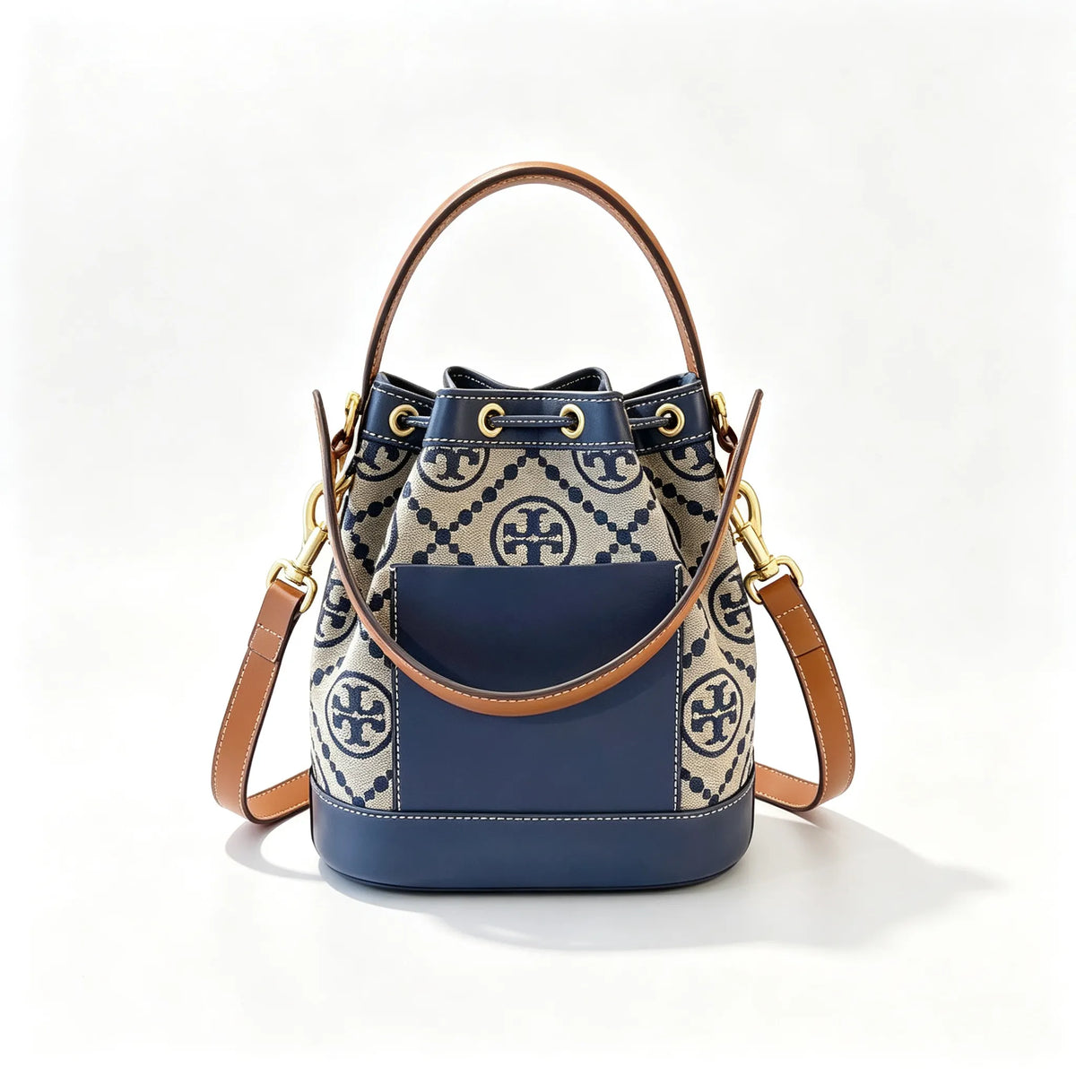 Tory Burch T Monogram | Navy blue and beige Monogram fabric leather trim  adjustable shoulder strap drawstring closure  women's designer mini jacquard bucket bag