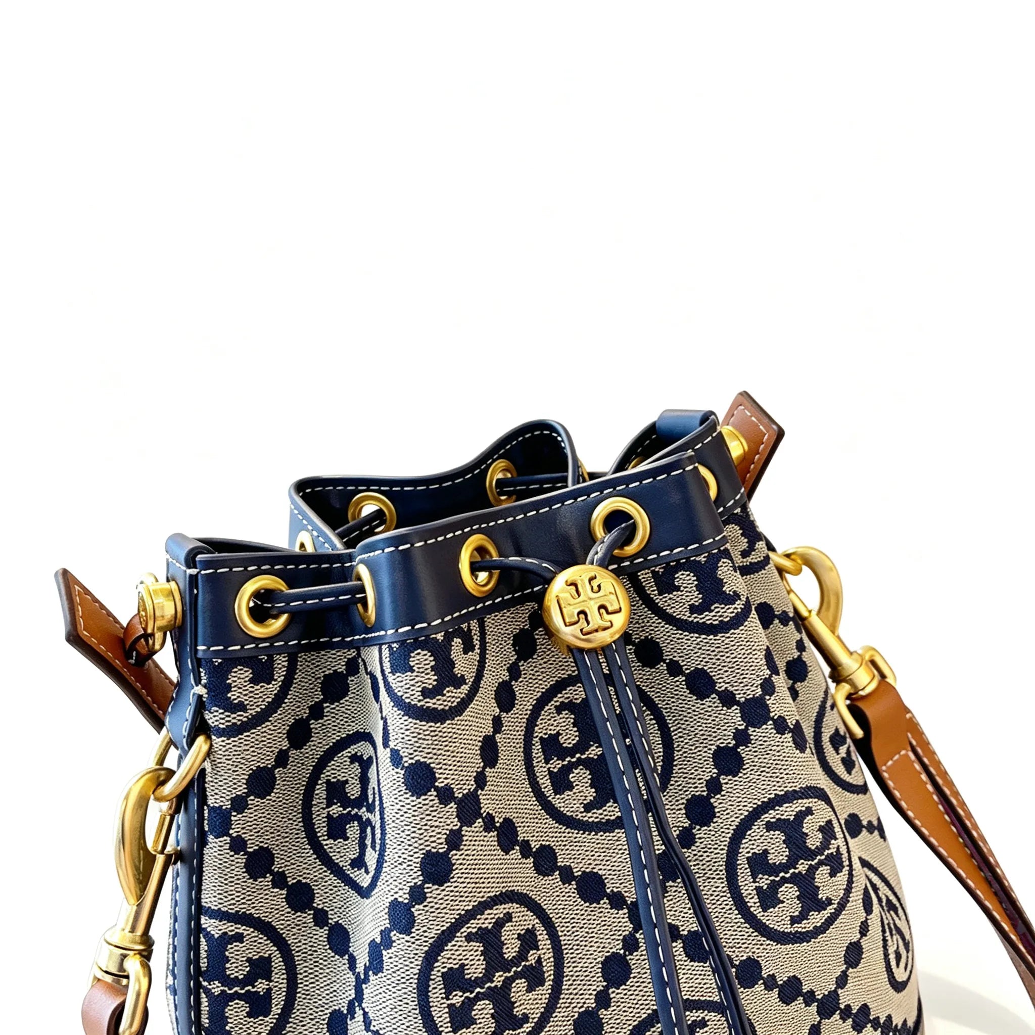 Tory Burch T Monogram | Navy blue and beige Monogram fabric leather trim  adjustable shoulder strap drawstring closure  women's designer mini jacquard bucket bag