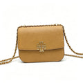 Tory Burch Eleanor | Off-white Nappa leather  adjustable shoulder strap  multiple carrying options  women's designer handbag