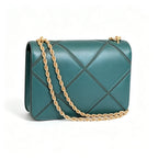 Tory Burch Eleanor in deep sea green with a gold double-T adjustable twist chain shoulder strap offering multiple carrying options for women