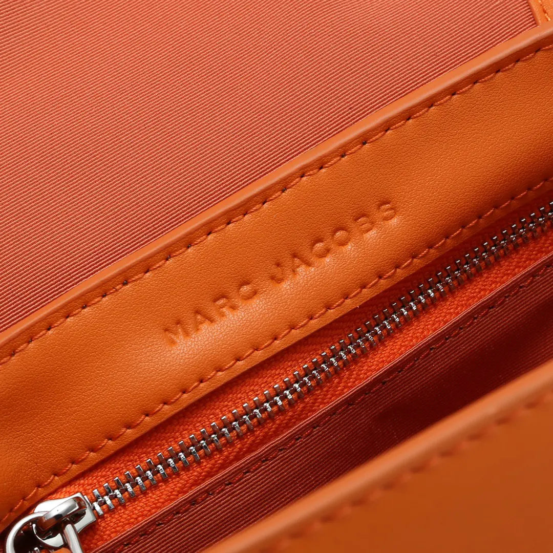 Marc Jacobs The J Marc Saddle Bag Orange Smooth Leather Crossbody Bag with Logo Strap