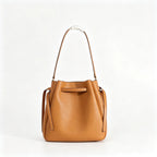Tory Burch Romy Tiramisu Brown Adjustable Shoulder Strap Drawstring Closure Women's Designer Large Pebble Leather Bucket Bag