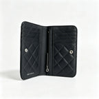 Tory Burch Willa black quilted leather wallet with multiple card slots and a zippered coin pocket a small m foldable women's wallet
