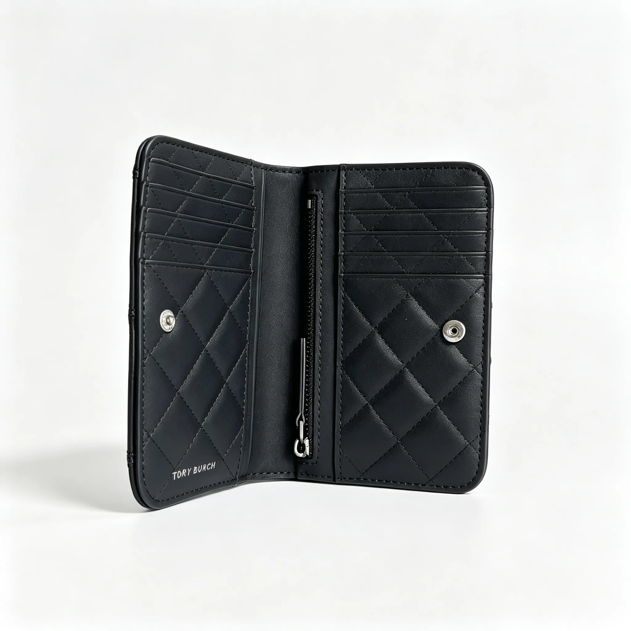 Tory Burch Willa black quilted leather wallet with multiple card slots and a zippered coin pocket a small m foldable women's wallet