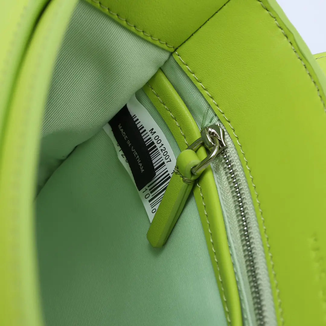 Marc Jacobs J Marc Saddle Bag, bright green smooth leather crossbody bag with brand logo shoulder strap.