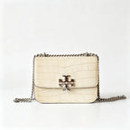 Tory Burch Eleanor off-white embossed leather twisted chain shoulder strap multiple carrying options for women