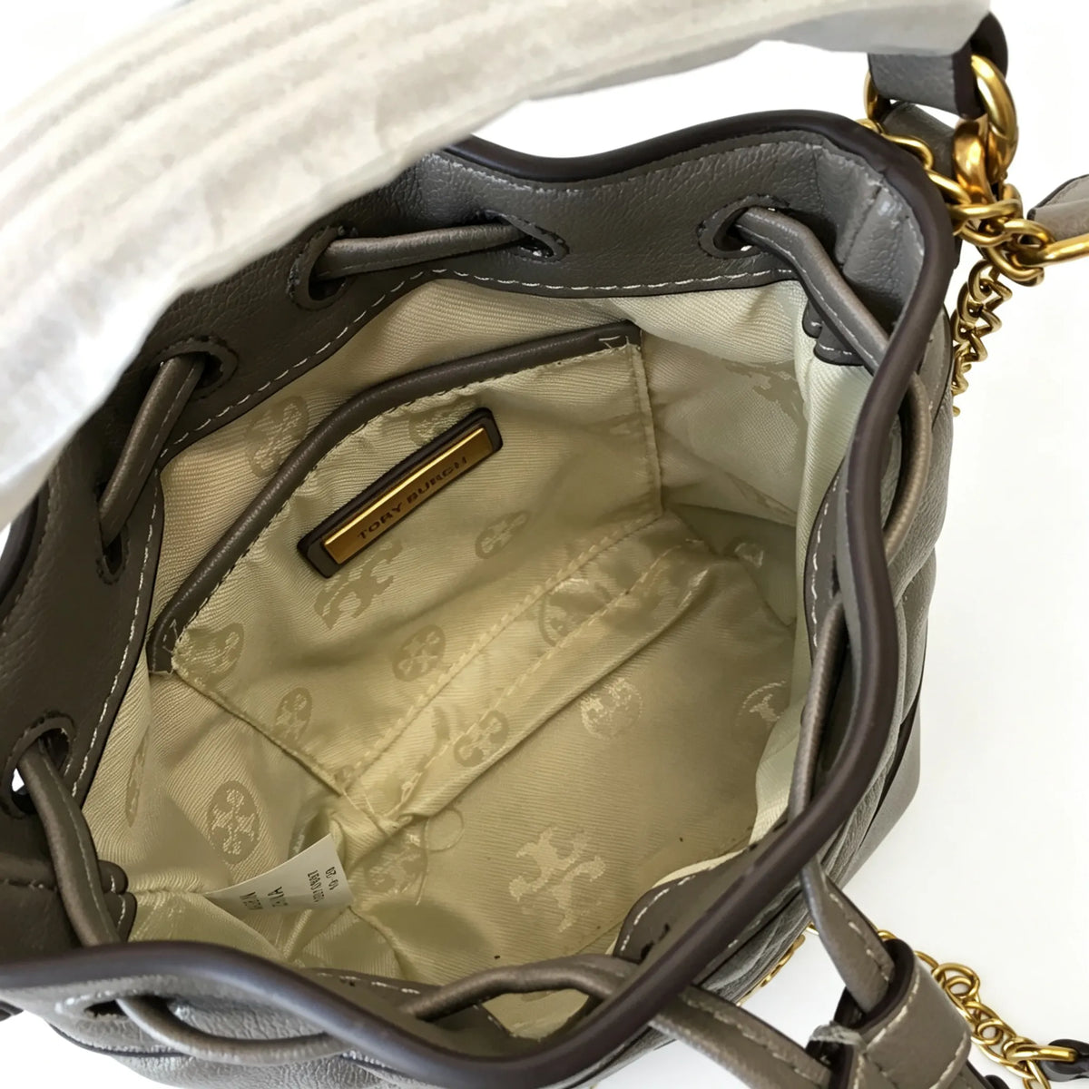 Tory Burch Willa | Grey-brown lambskin leatheradorned with a gold double-T logo detachable chain shoulder strap  drawstring closure  women's designer handbag