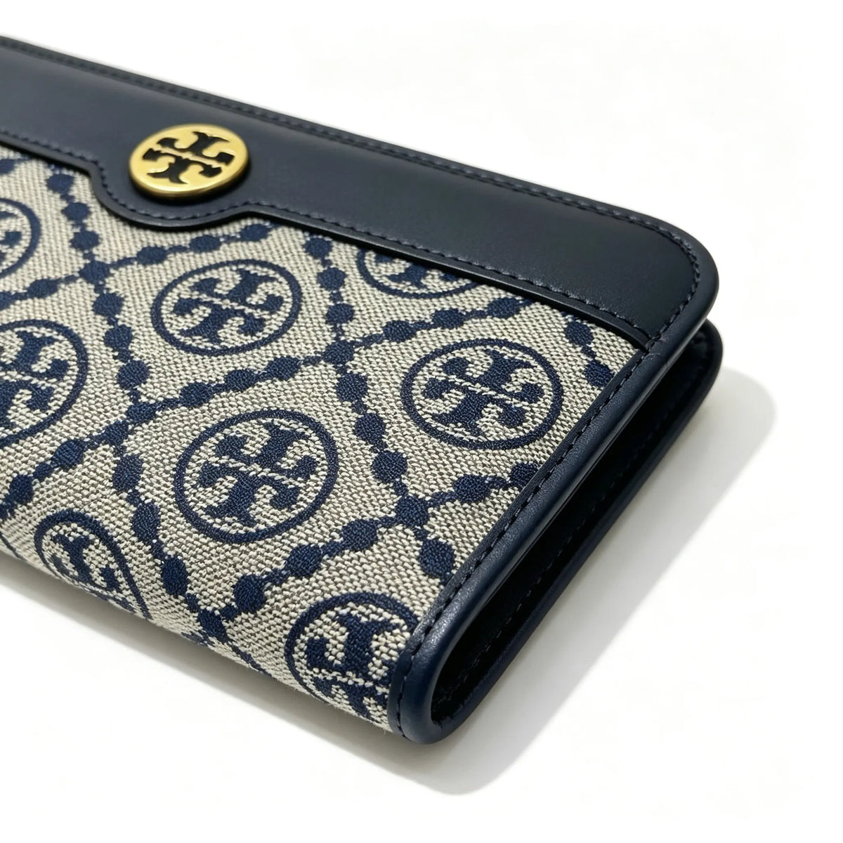 Tory Burch T Monogram wallet in navy and beige Monogram canvas, long with multiple card slots and a zipper