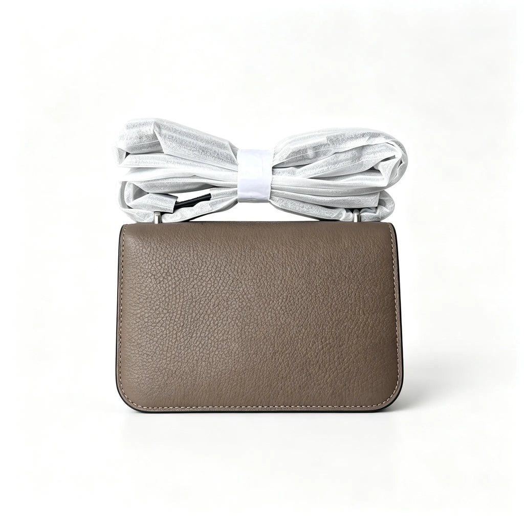 Tory Burch Eleanor, elephant grey with a silver double-T detachable chain shoulder strap offering multiple carrying options for women