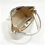 Tory Burch McGraw | Off-white pebbled leather with an adjustable shoulder strap and top handle  offering multiple carrying options  A women's designer handbag  perfect for work and weekend getaways