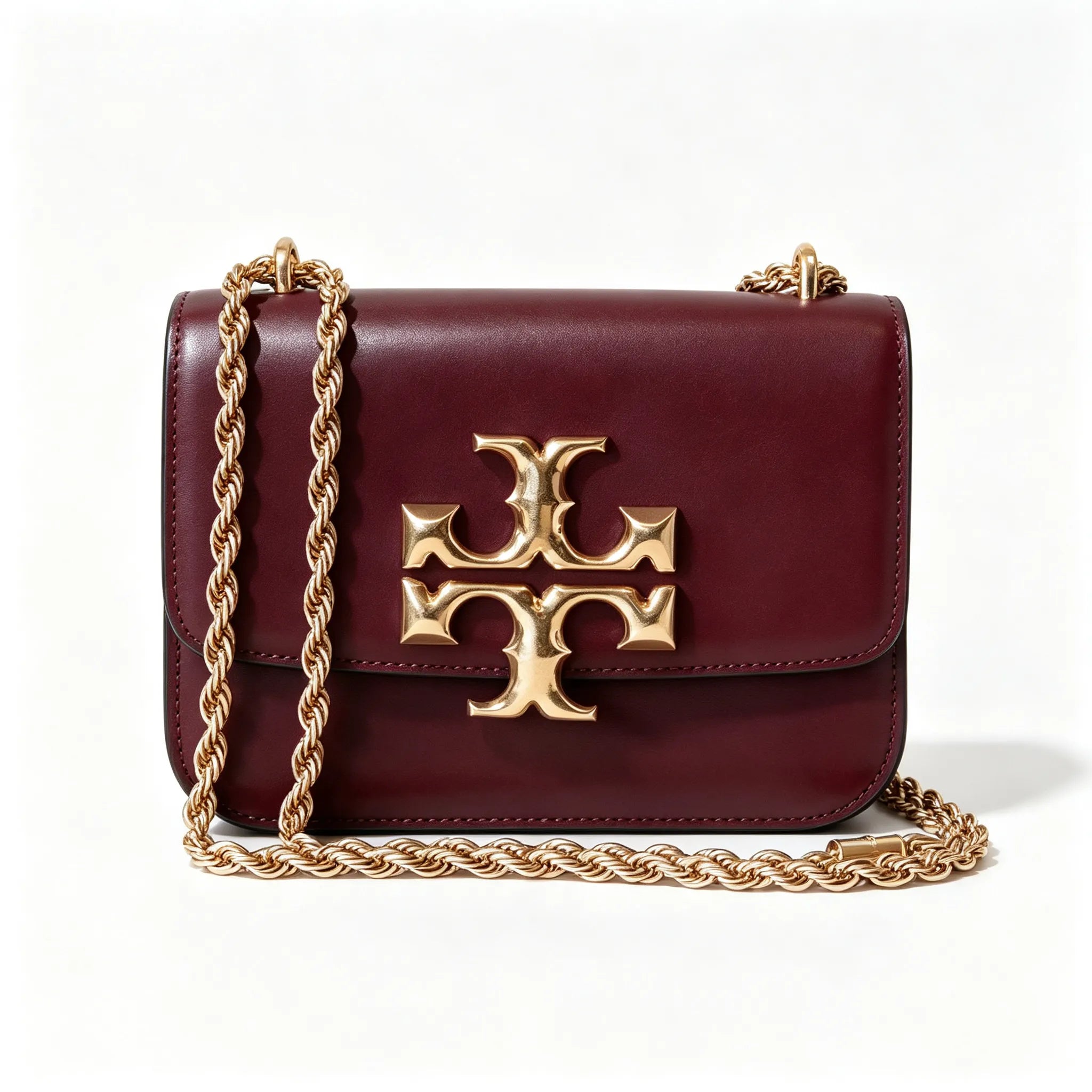 Tory Burch Eleanor burgundy with a gold double-T adjustable twist chain shoulder strap offering multiple carrying options for women