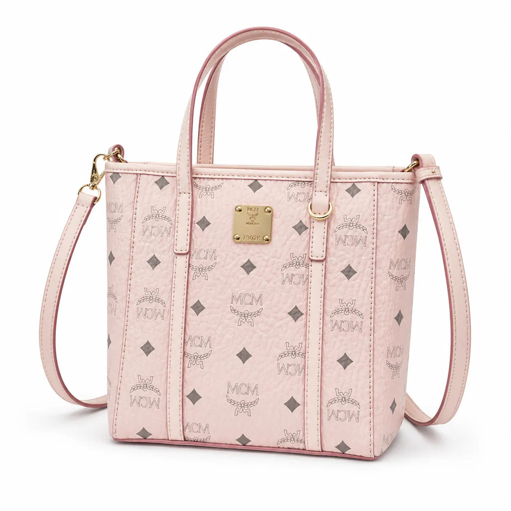 MCM Pink Visetos Monogram Mini Tote Bag | Gold-Tone Hardware + Removable Crossbody Strap — Designer Leather Top-Handle Bag