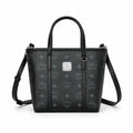 MCM Mini Toni Visetos Handbag, black, women’s handbag, featuring a detachable crossbody strap and the classic monogram print.