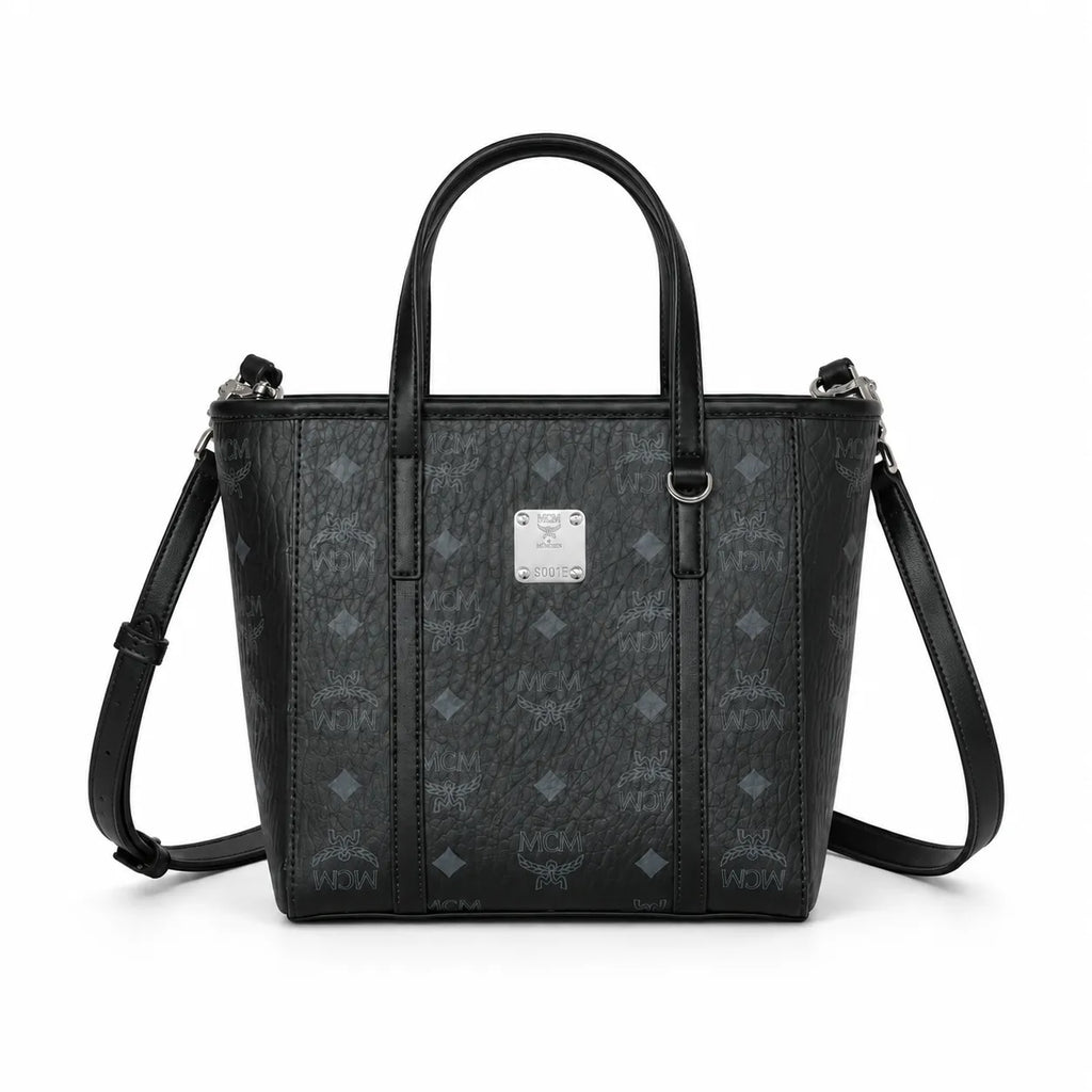 MCM Mini Toni Visetos Handbag, black, women’s handbag, featuring a detachable crossbody strap and the classic monogram print.