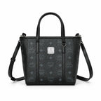 MCM Mini Toni Visetos Handbag, black, women’s handbag, featuring a detachable crossbody strap and the classic monogram print.