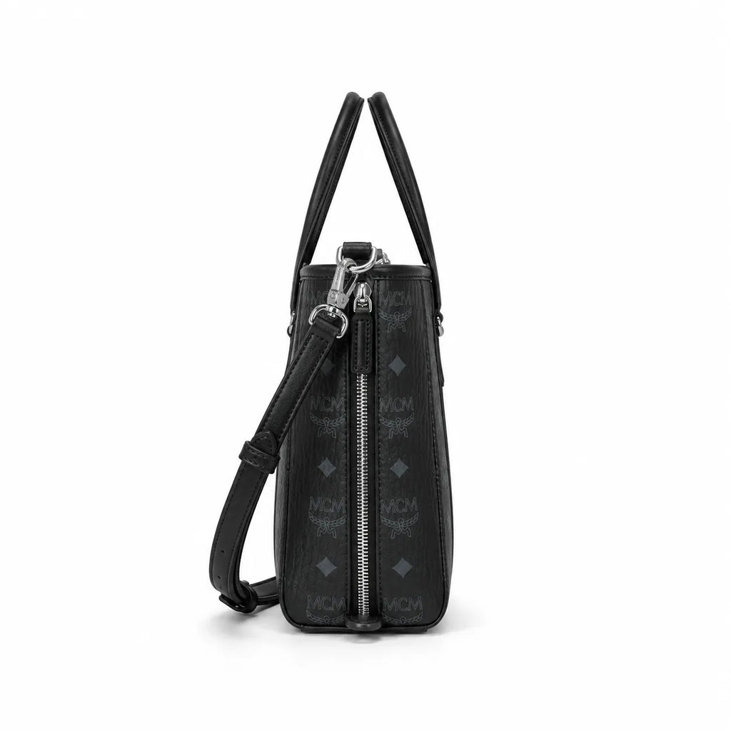 MCM Mini Toni Visetos Handbag, black, women’s handbag, featuring a detachable crossbody strap and the classic monogram print.