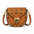 MCM Cognac Visetos Saddle Bag – Brown Monogram Crossbody Purse with Gold-Tone Buckle