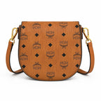MCM Cognac Visetos Saddle Bag – Brown Monogram Crossbody Purse with Gold-Tone Buckle