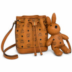 MCM Dessau Bucket Bag Visetos | Cognac Monogram Drawstring Crossbody Leather — Dry Cognac