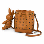 MCM Dessau Bucket Bag Visetos | Cognac Monogram Drawstring Crossbody Leather — Dry Cognac